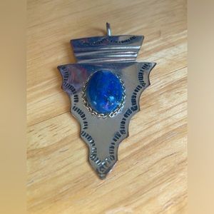 Metal Arrowhead pendant with blue center stone, southwestern style